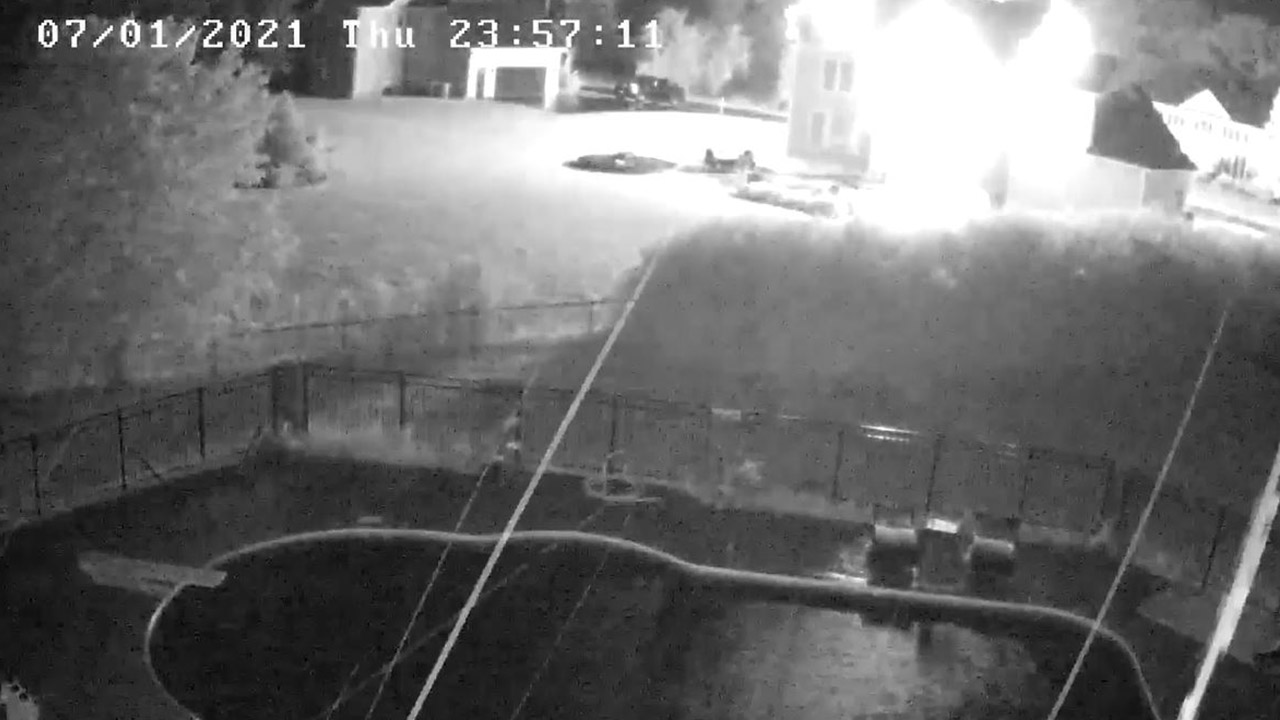 Security camera captures lightning striking house